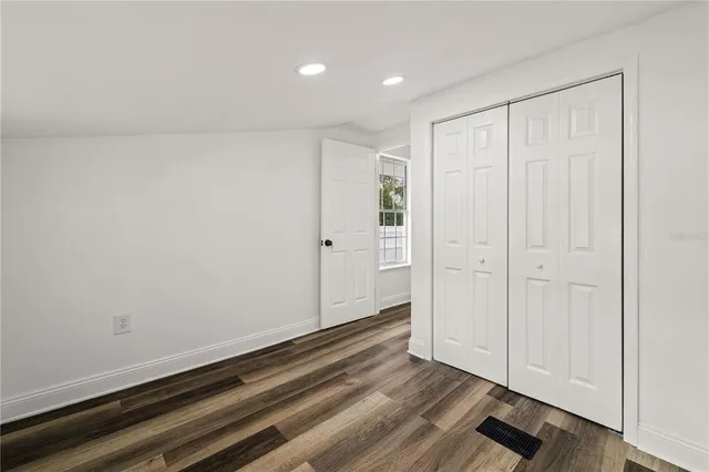 a house view with a backyard space