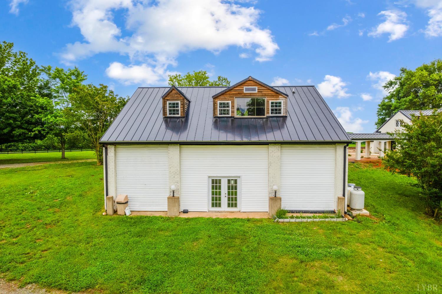 7845 Bear Creek Road Gladys, VA 24554 - Photo 27 of 99 a front view of a house with a yard