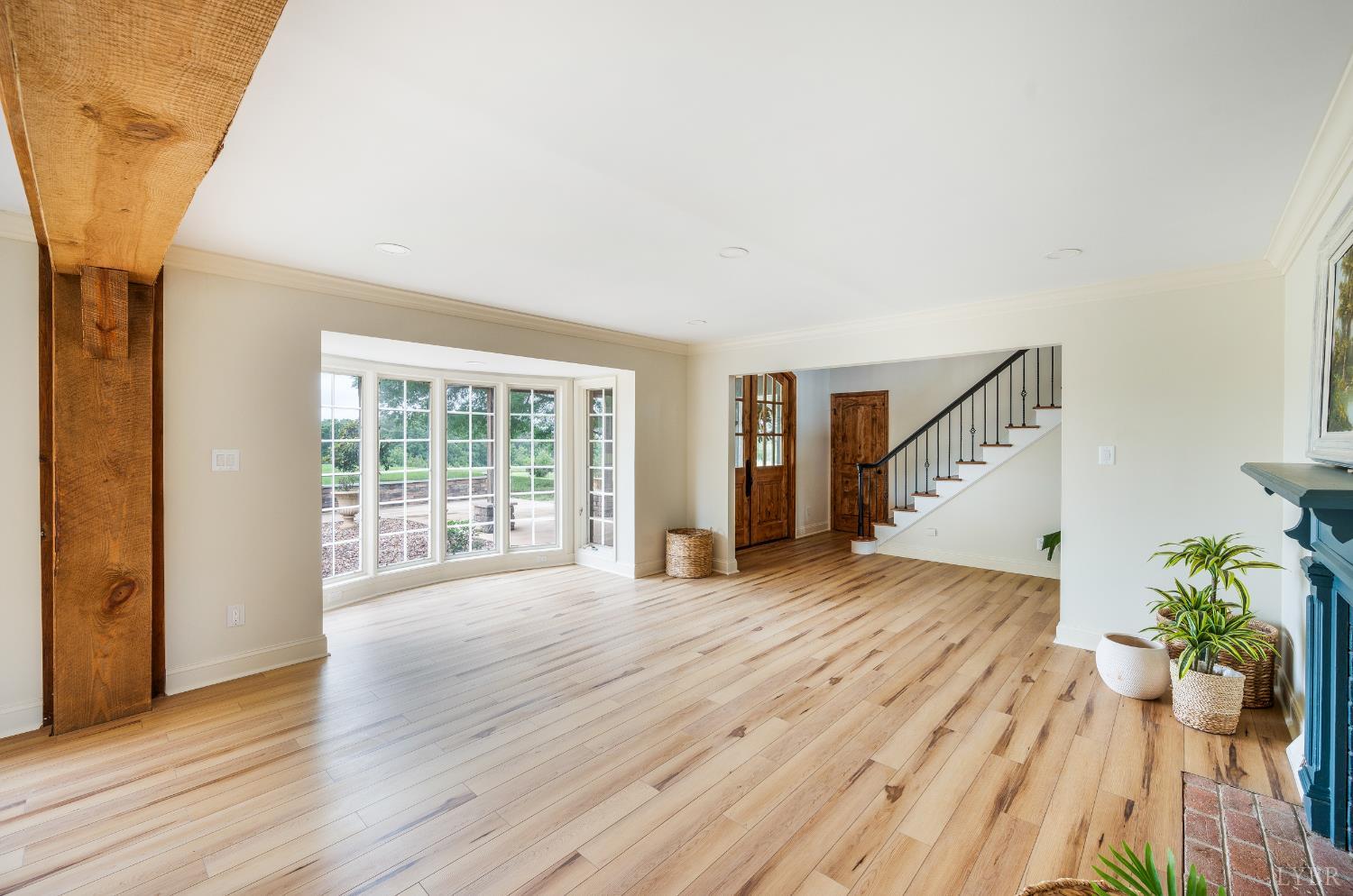 7845 Bear Creek Road Gladys, VA 24554 - Photo 35 of 99 a view of an empty room with wooden floor and a window