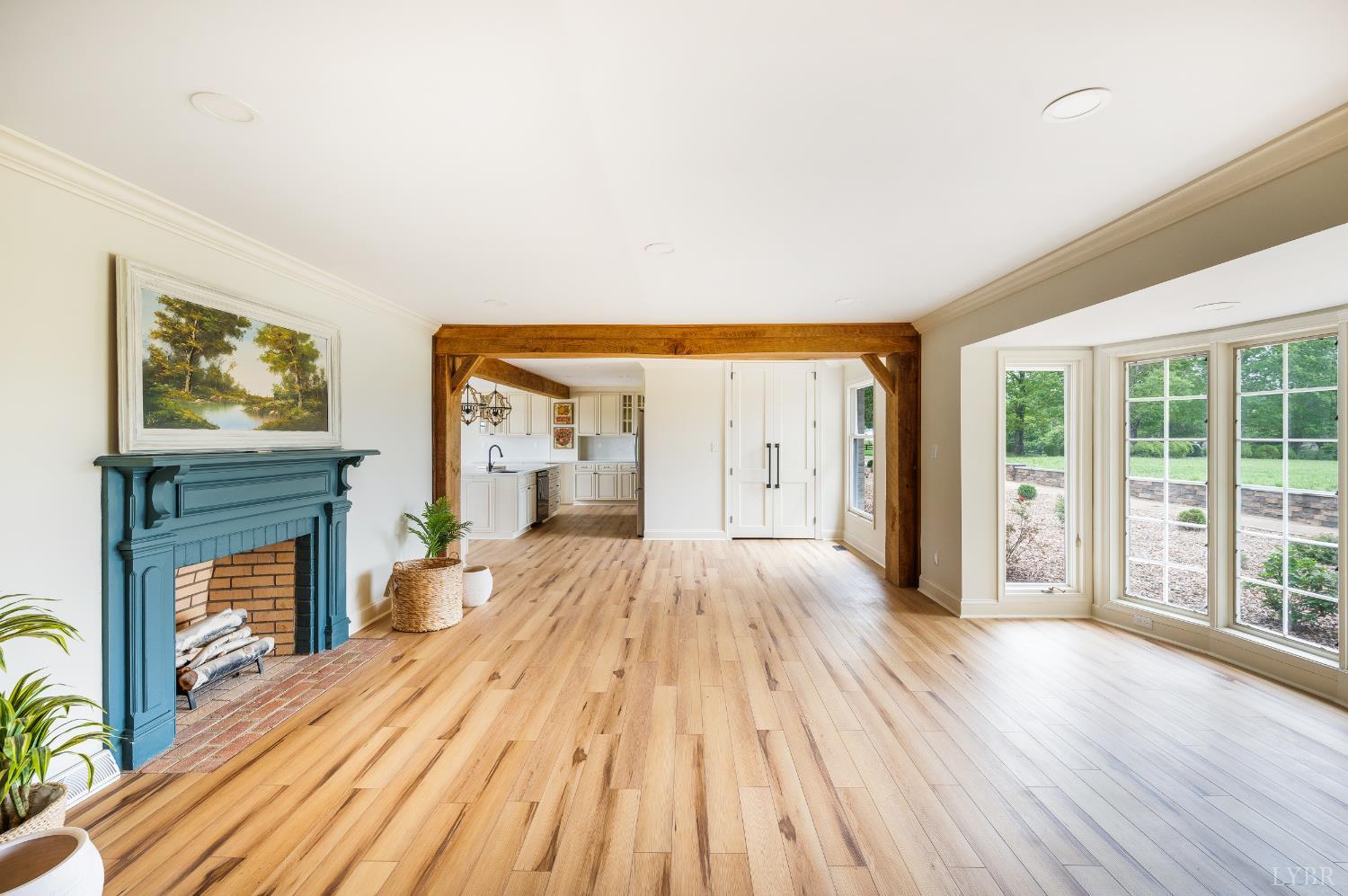 7845 Bear Creek Road Gladys, VA 24554 - Photo 36 of 99 a view of empty room with wooden floor and fireplace