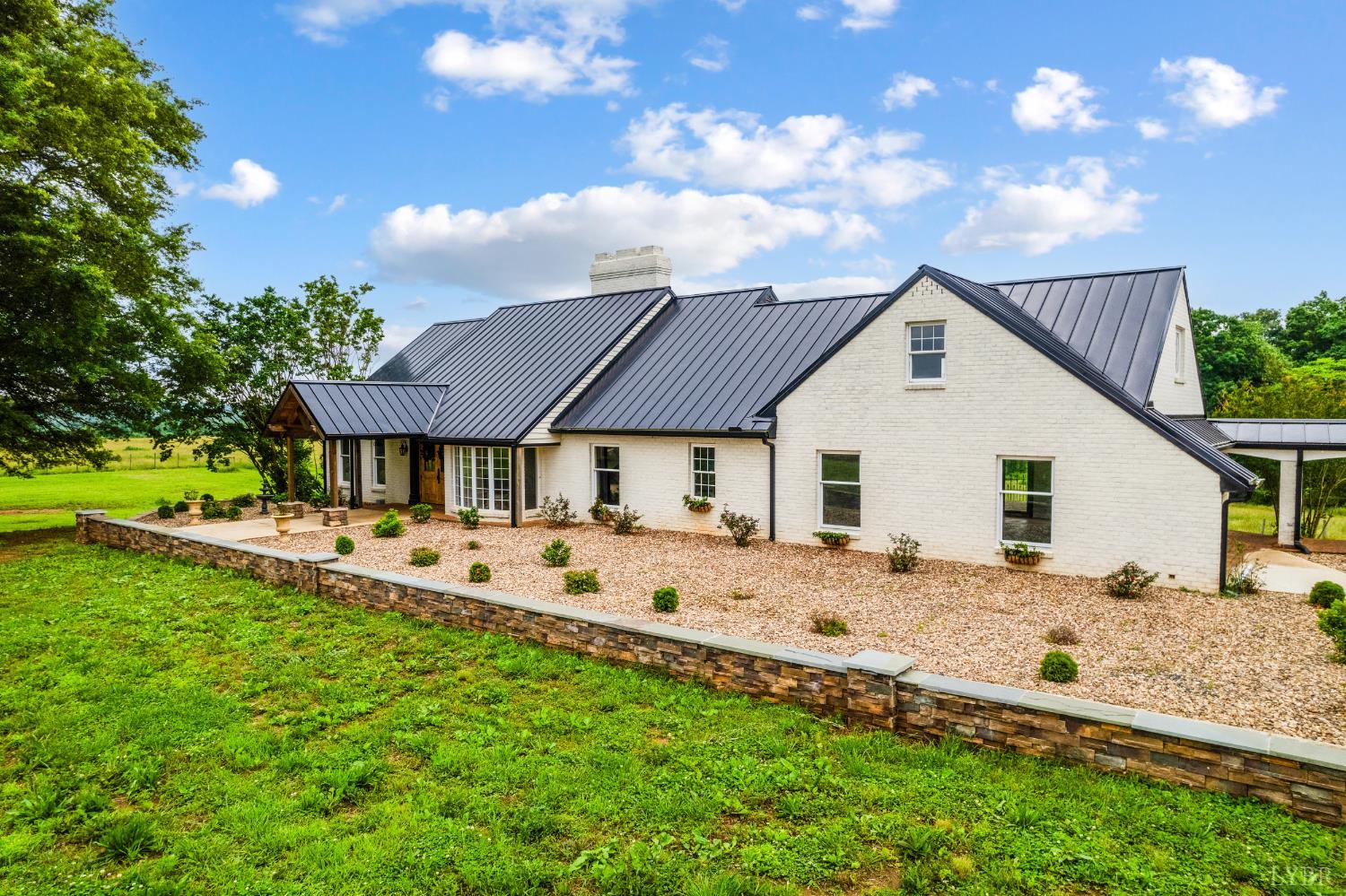 7845 Bear Creek Road Gladys, VA 24554 - Photo 4 of 99 a view of a house with a yard and sitting area