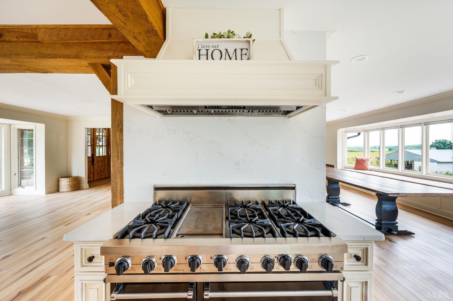 7845 Bear Creek Road Gladys, VA 24554 - Photo 41 of 99 a kitchen with a stove and a wooden floor