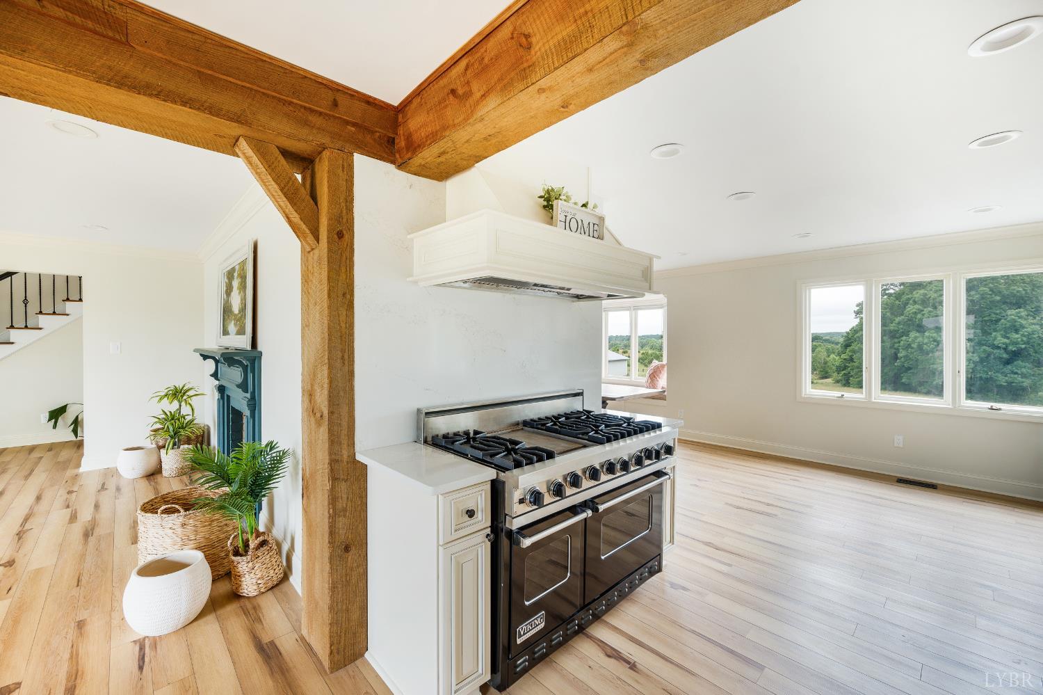 7845 Bear Creek Road Gladys, VA 24554 - Photo 42 of 99 a kitchen with stainless steel appliances granite countertop a stove and a white cabinets