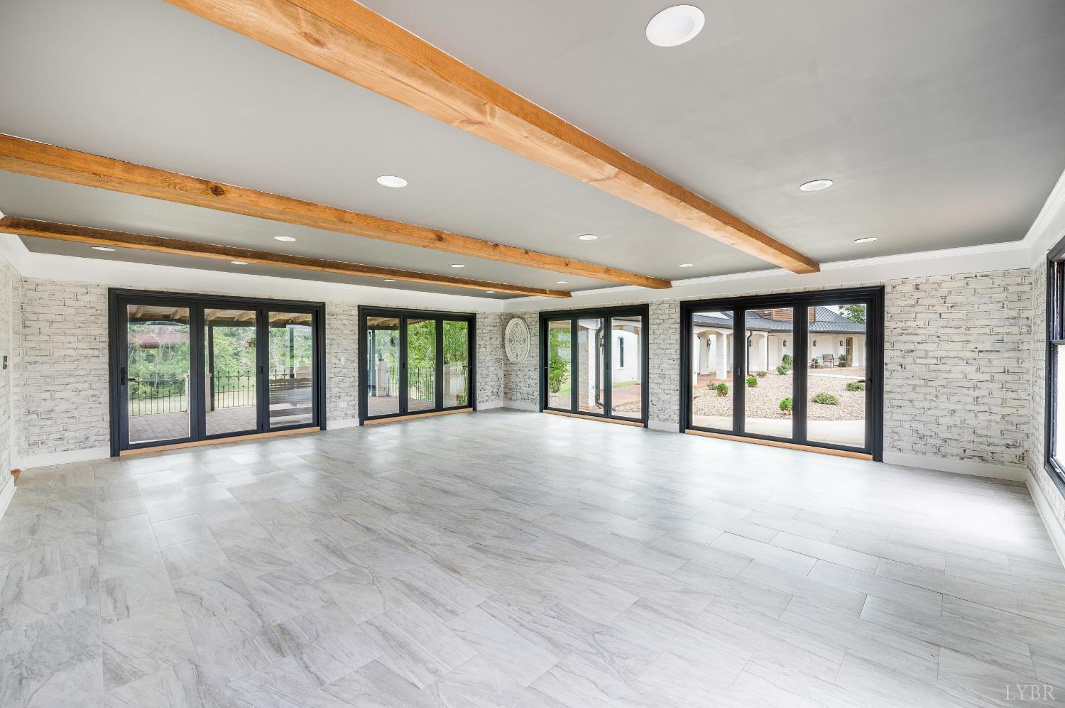 7845 Bear Creek Road Gladys, VA 24554 - Photo 50 of 99 a view of an empty room with wooden floor and a window