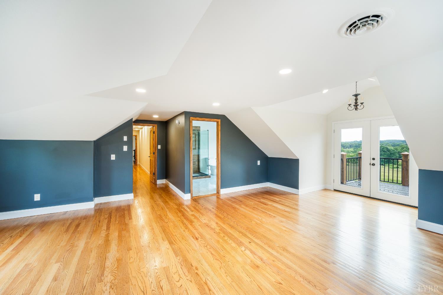 7845 Bear Creek Road Gladys, VA 24554 - Photo 66 of 99 a view of an empty room with wooden floor and a window
