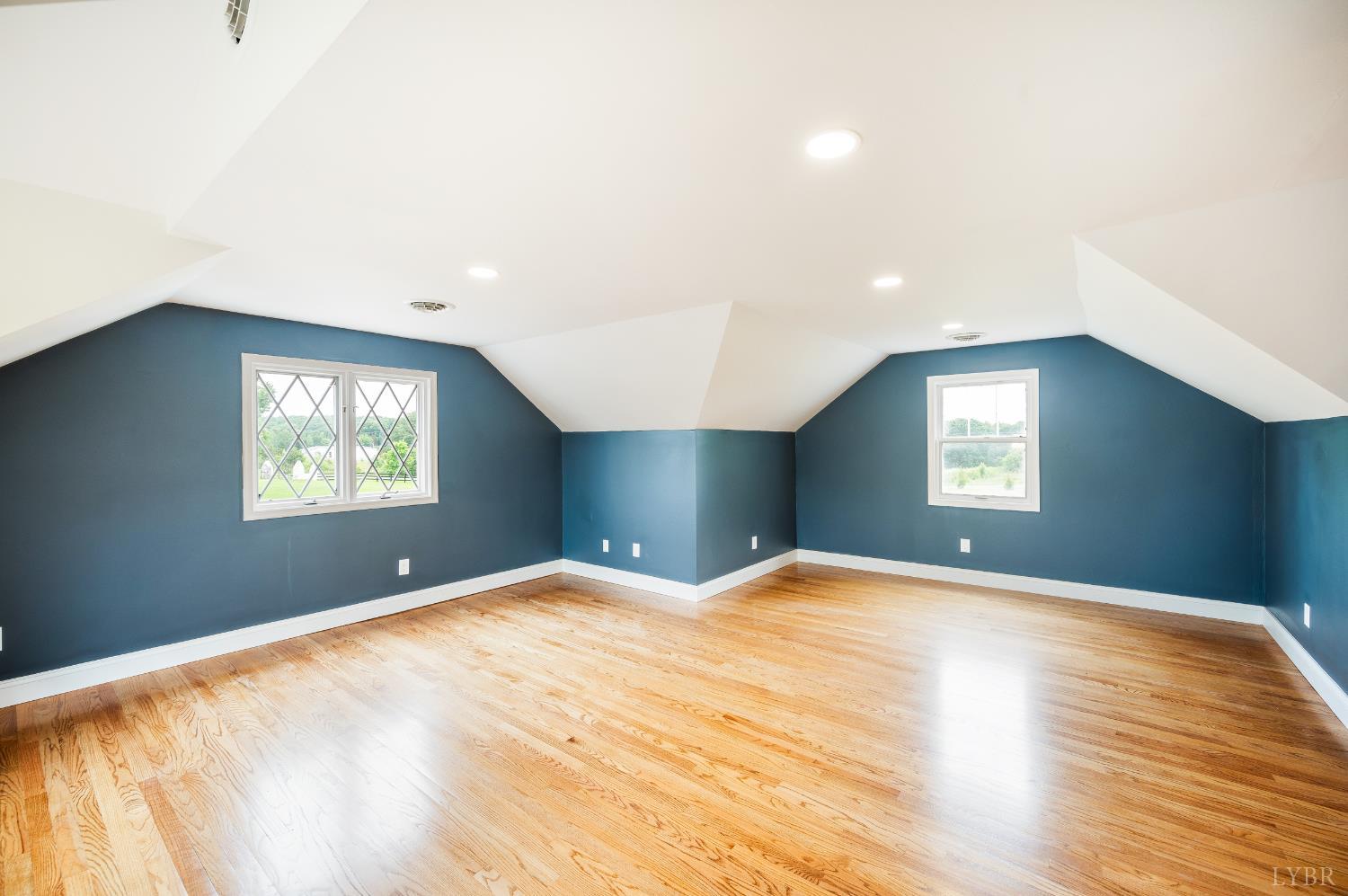 7845 Bear Creek Road Gladys, VA 24554 - Photo 67 of 99 a view of an empty room with window and wooden floor