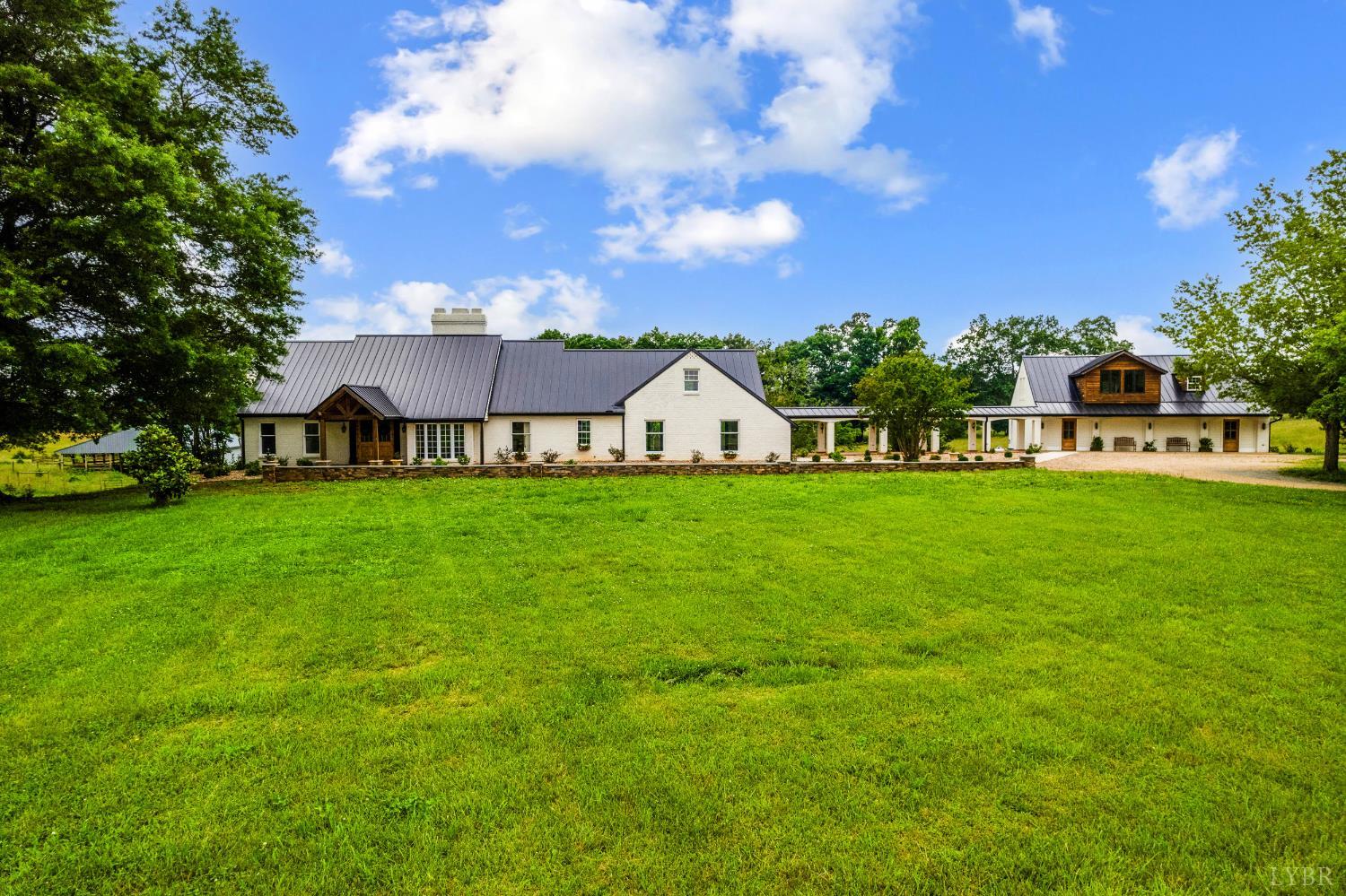 7845 Bear Creek Road Gladys, VA 24554 - Photo 8 of 99 a view of a house with a big yard and sitting area