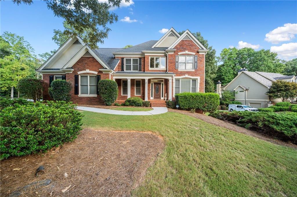 508 Sackman Falls Court Canton, GA 30114 - Photo 1 of 1 a front view of a house with a yard