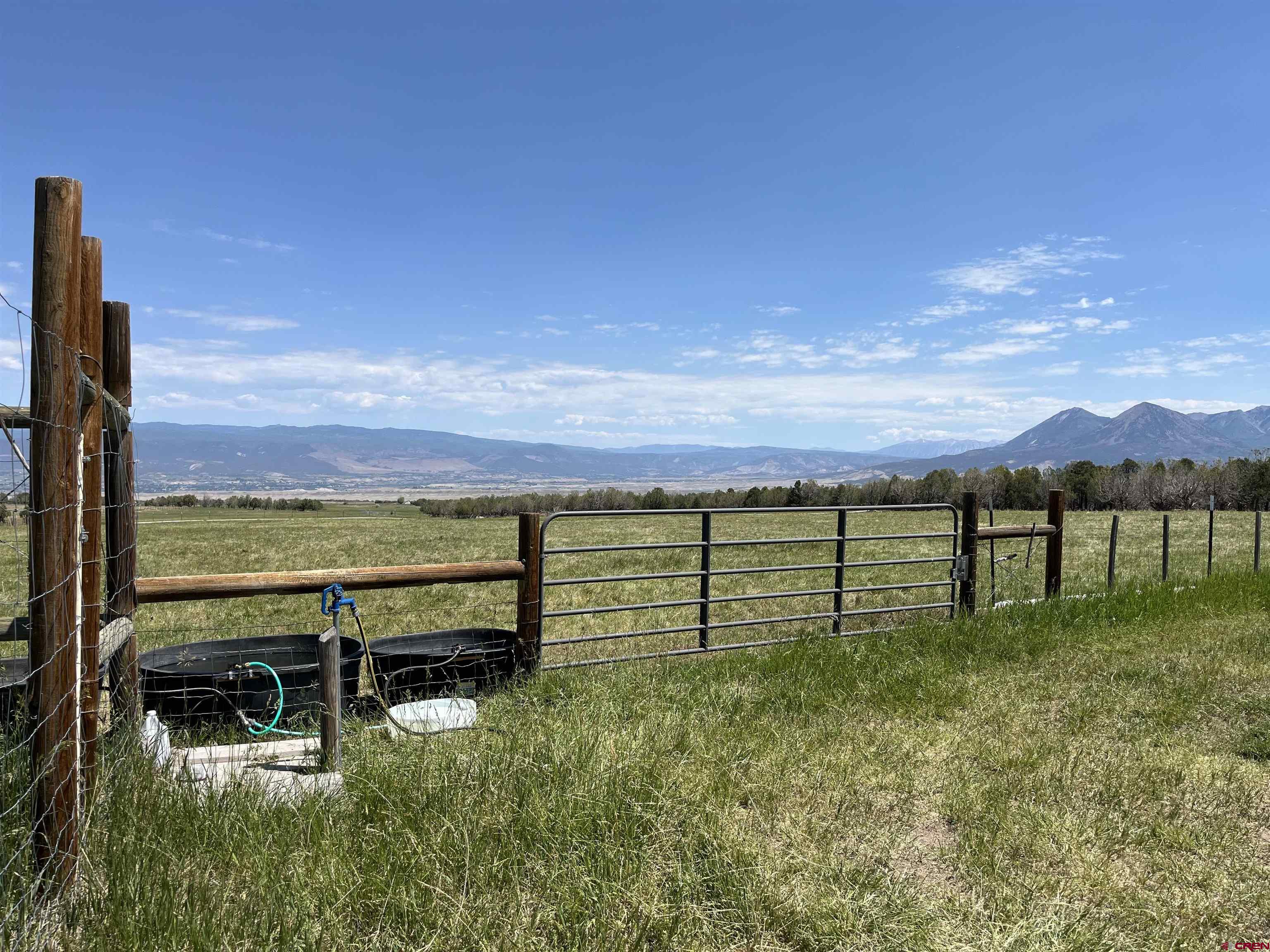 678 3375th Road Crawford, CO 81415 - Photo 10 of 42 a view of a lake with a yard