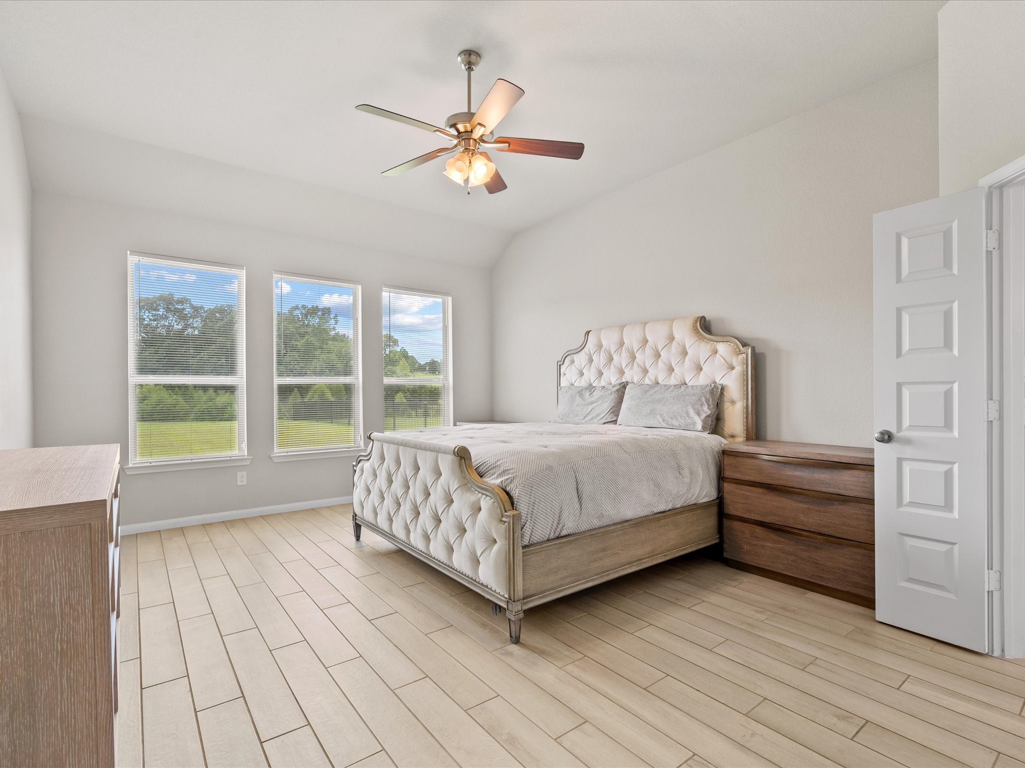 262 Peninsula Point Drive Montgomery, TX 77356 - Photo 13 of 45 a bed sitting in a spacious bedroom next to a window