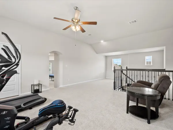 a kitchen with a sink stove and refrigerator