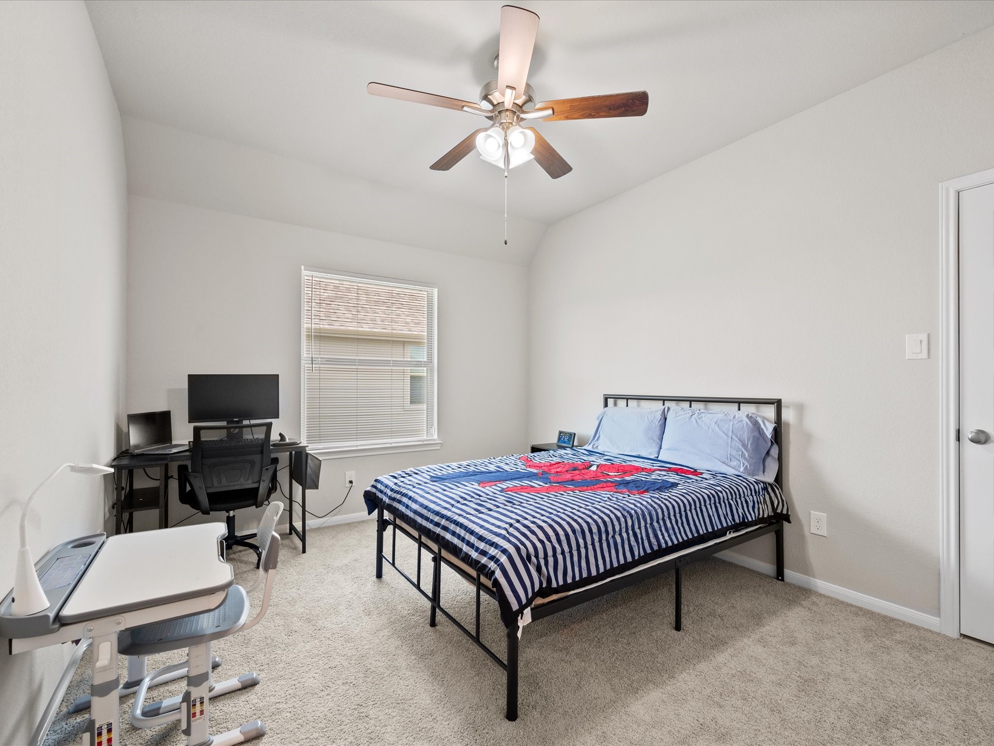 262 Peninsula Point Drive Montgomery, TX 77356 - Photo 23 of 45 a bedroom with a bed and a window