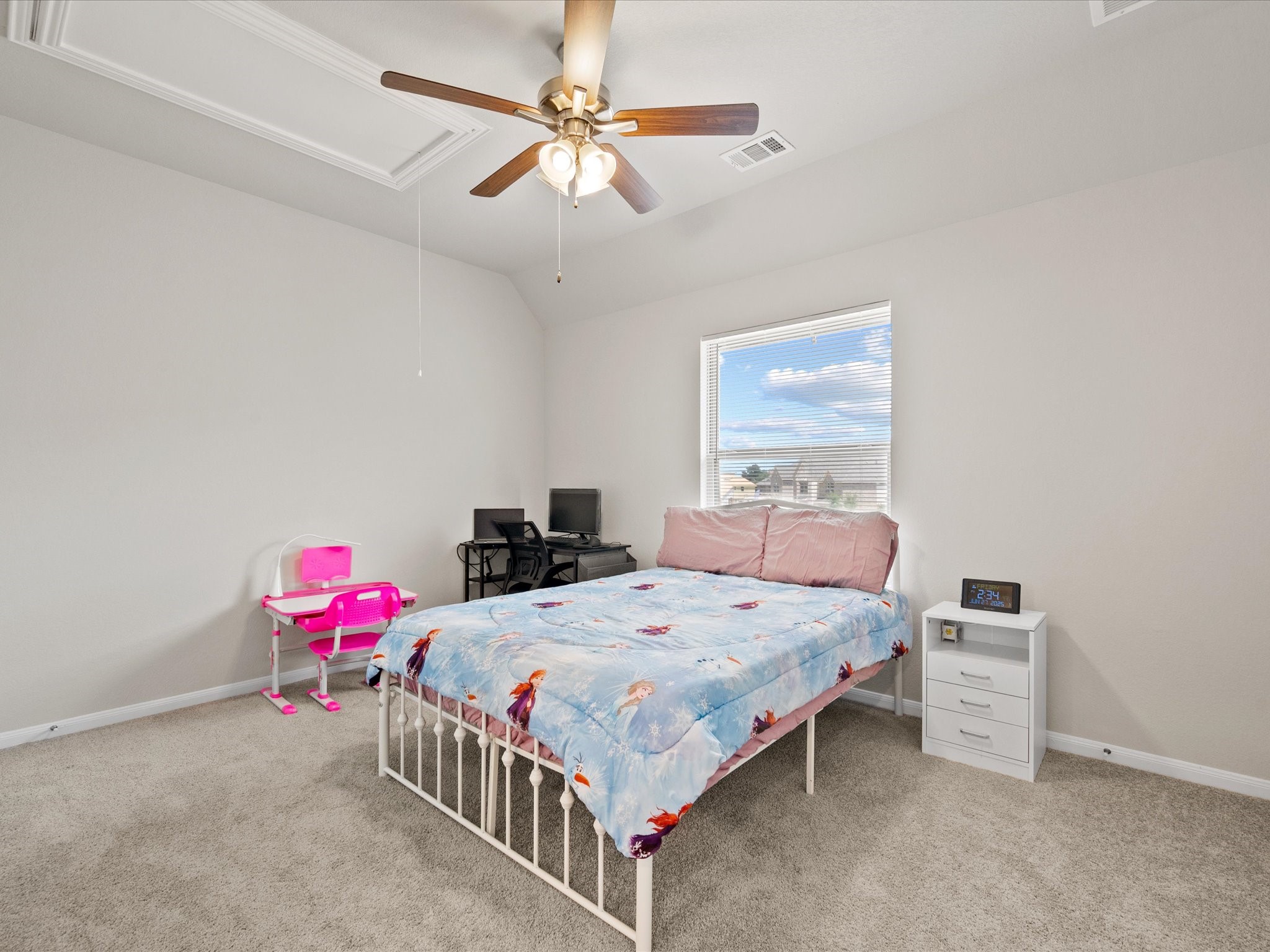 262 Peninsula Point Drive Montgomery, TX 77356 - Photo 26 of 45 a bedroom with a bed and a chandelier