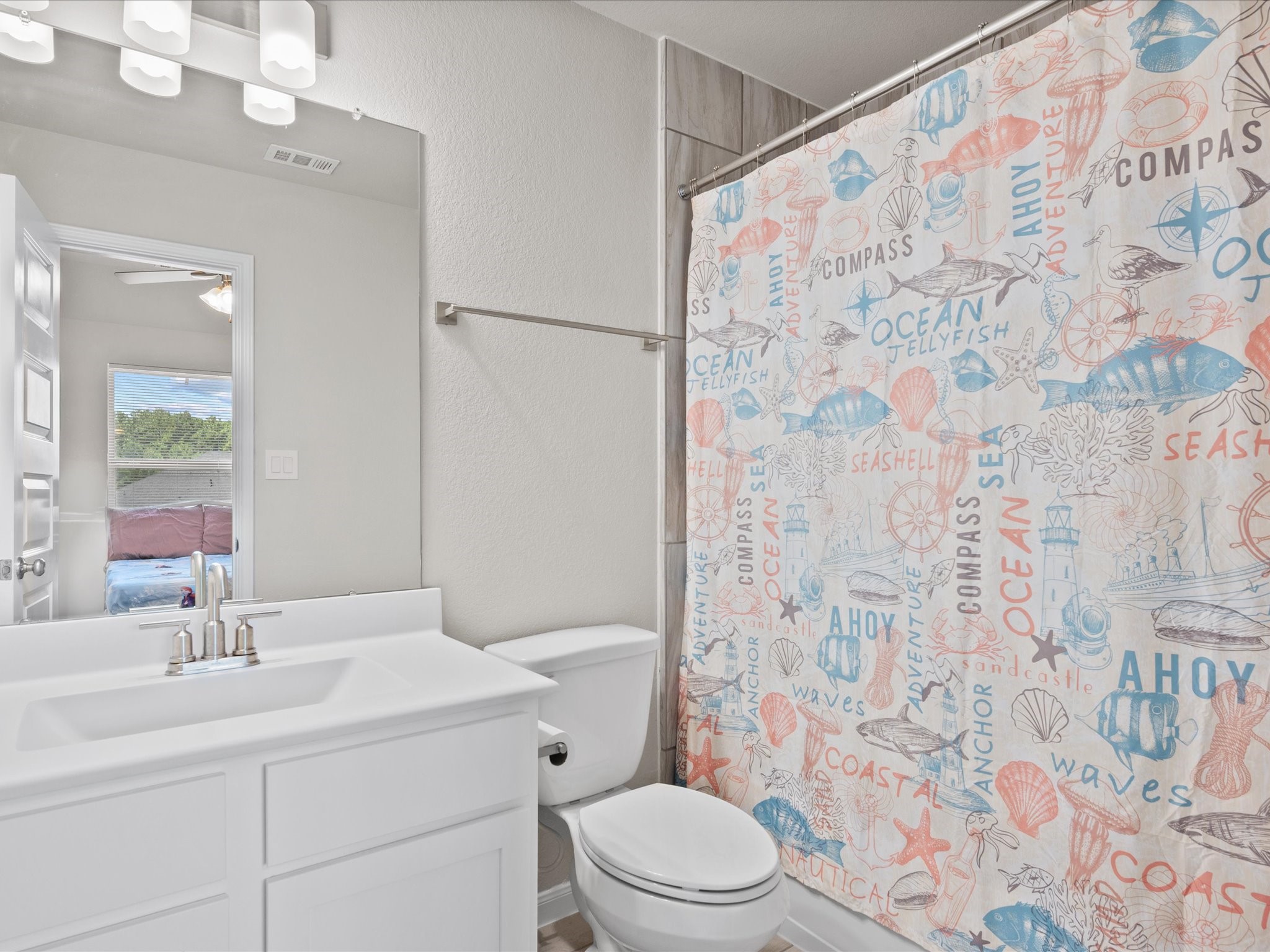 262 Peninsula Point Drive Montgomery, TX 77356 - Photo 27 of 45 a bathroom with a sink toilet and shower