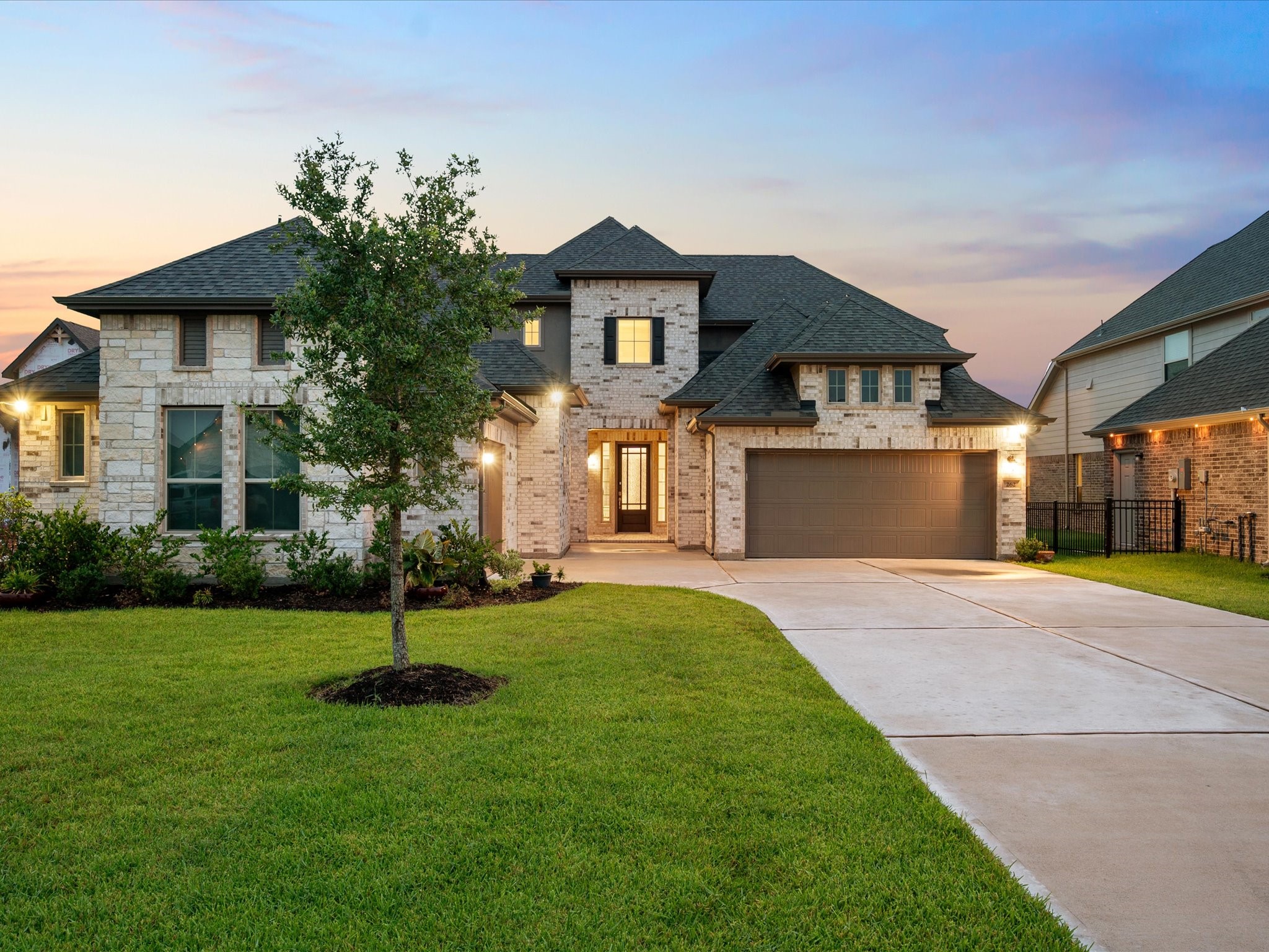 262 Peninsula Point Drive Montgomery, TX 77356 - Photo 45 of 45 a front view of a house with a garden and yard
