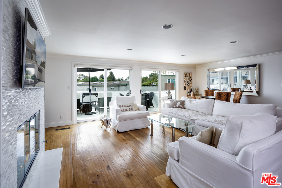 248 Paradise Cove Road Malibu, CA 90265 - Photo 14 of 35 a living room with furniture and a large window