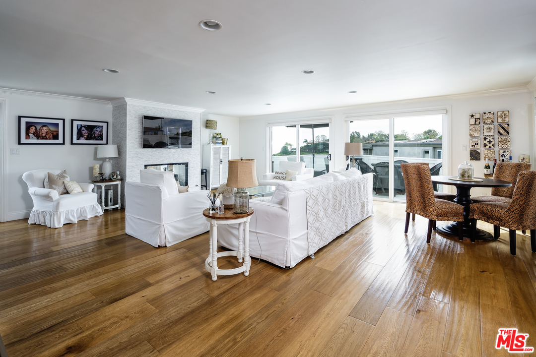248 Paradise Cove Road Malibu, CA 90265 - Photo 3 of 35 a living room with furniture and a wooden floor