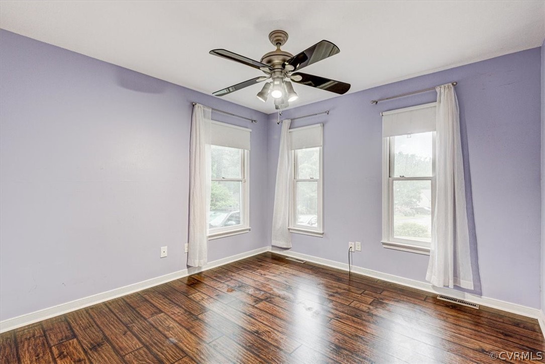 3909 Echo Ridge Place Midlothian, VA 23112 - Photo 7 of 14 a view of an empty room with wooden floor and a window