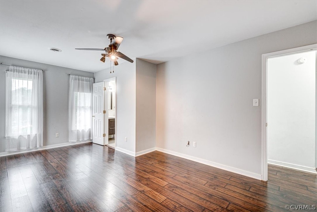 3909 Echo Ridge Place Midlothian, VA 23112 - Photo 9 of 14 a view of a room with wooden floor and ceiling fan