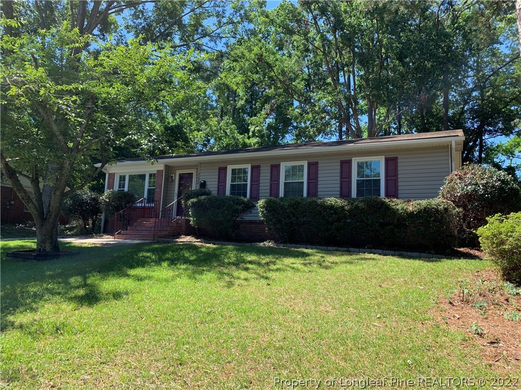3629 Drayton Road Fayetteville, NC 28303 - Photo 2 of 31 a house view with a garden space