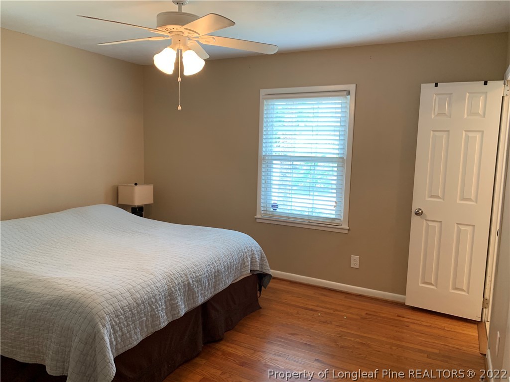 3629 Drayton Road Fayetteville, NC 28303 - Photo 22 of 31 a bedroom with a bed and a window