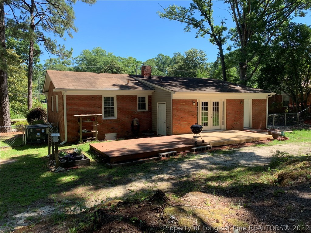 3629 Drayton Road Fayetteville, NC 28303 - Photo 27 of 31 a view of a house with a yard