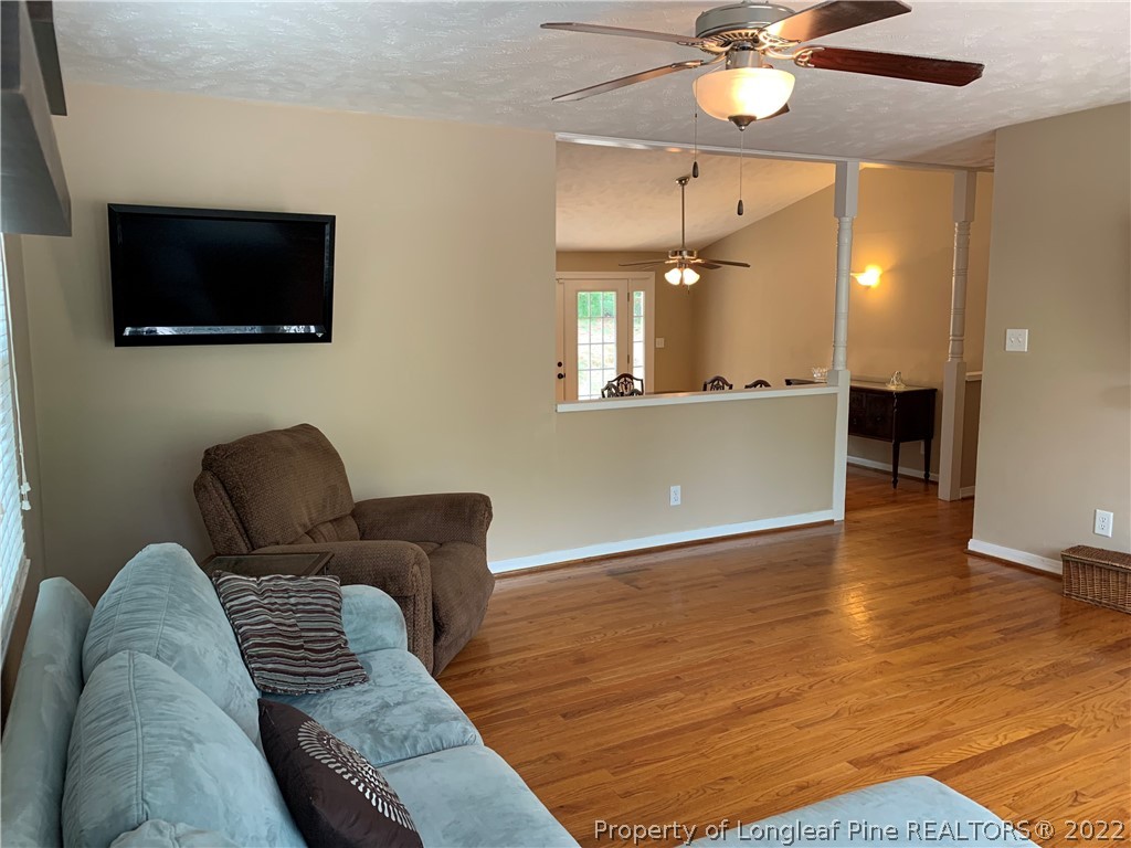 3629 Drayton Road Fayetteville, NC 28303 - Photo 5 of 31 a living room with furniture and a flat screen tv