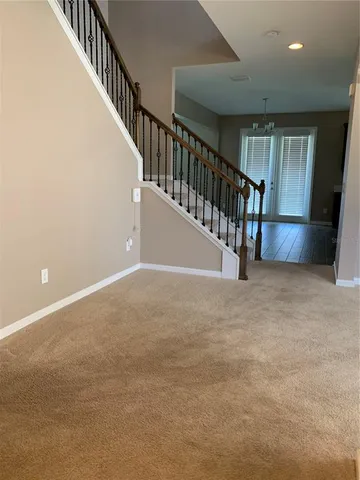 a view of an entryway with stairs