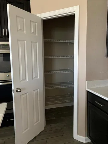 a view of a room with a sink and dishwasher