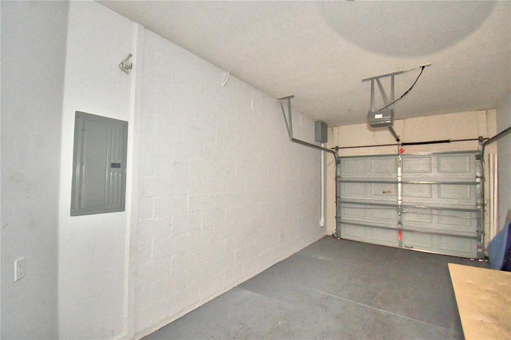 3151 Sinclair Street, Unit 104 Orlando, FL 32835 - Photo 19 of 64 a view of an empty walk in closet