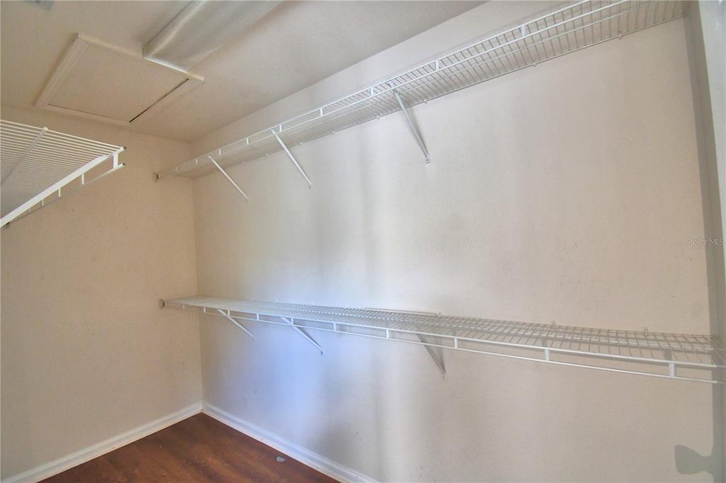 3151 Sinclair Street, Unit 104 Orlando, FL 32835 - Photo 24 of 64 a view of a room with wooden floor