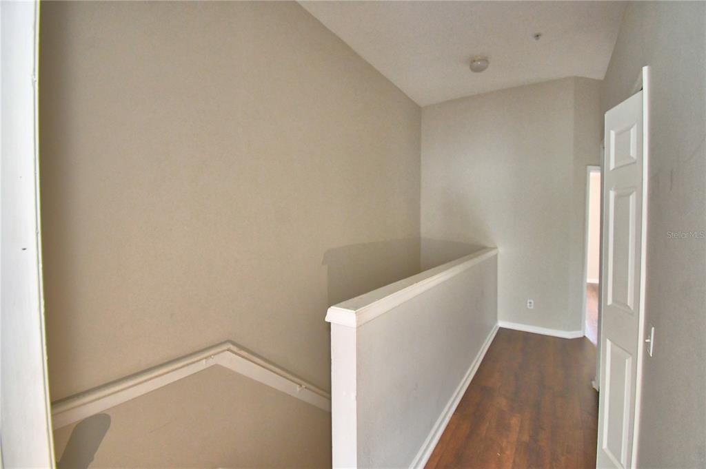3151 Sinclair Street, Unit 104 Orlando, FL 32835 - Photo 30 of 64 a view of an empty walk in closet