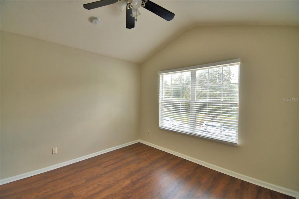 3151 Sinclair Street, Unit 104 Orlando, FL 32835 - Photo 42 of 64 an empty room with a window
