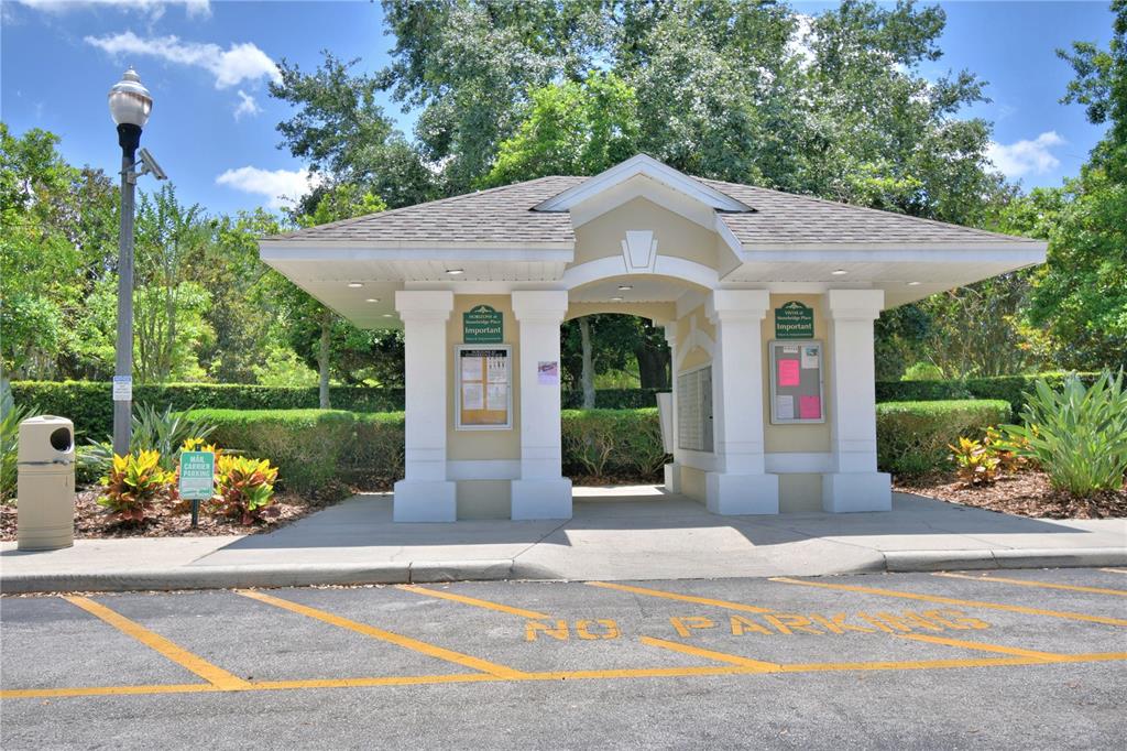 3151 Sinclair Street, Unit 104 Orlando, FL 32835 - Photo 55 of 64 a front view of a house with porch