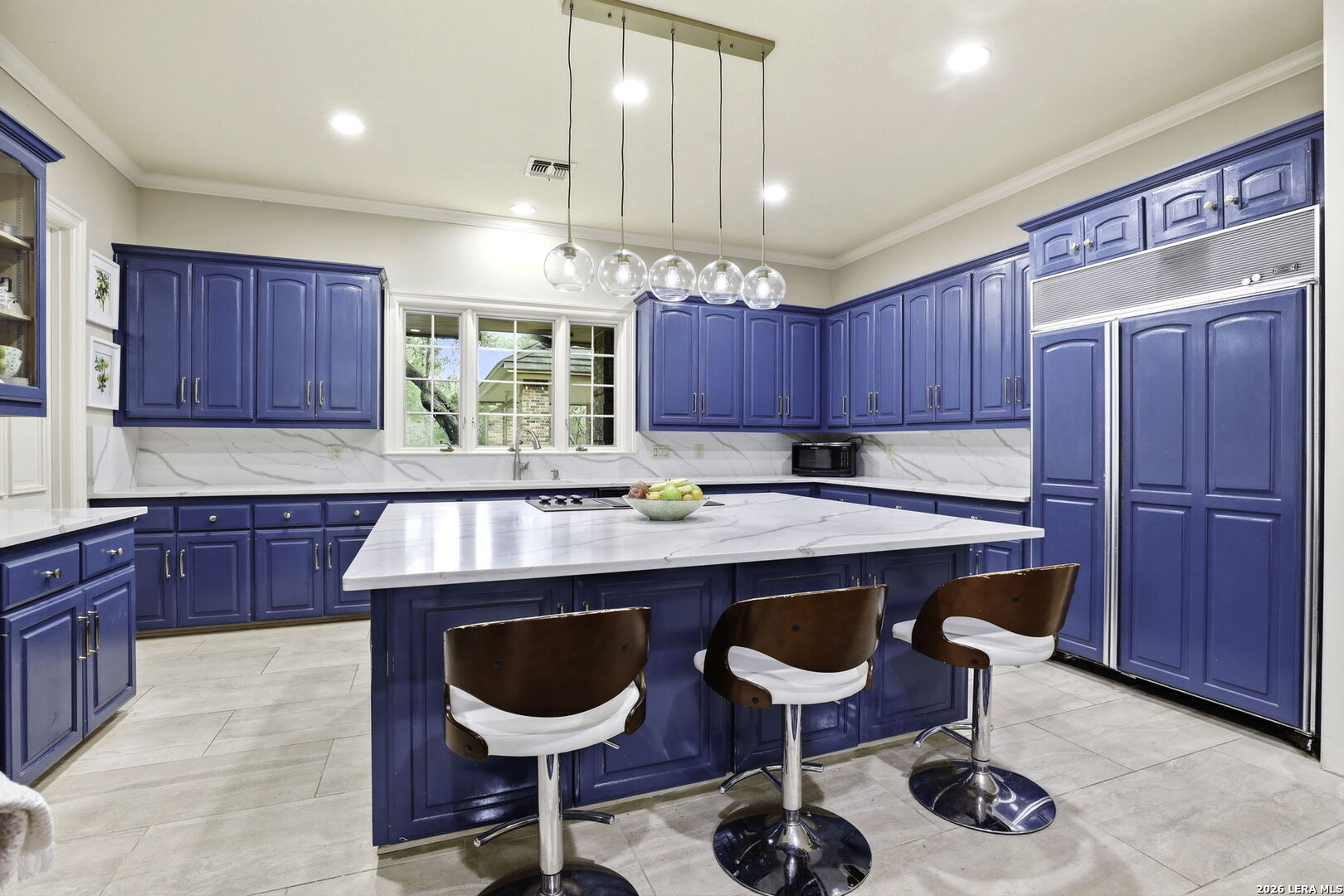 21759 Forest Waters Circle Garden Ridge, TX 78266 - Photo 11 of 30 a kitchen with a dining table and chairs