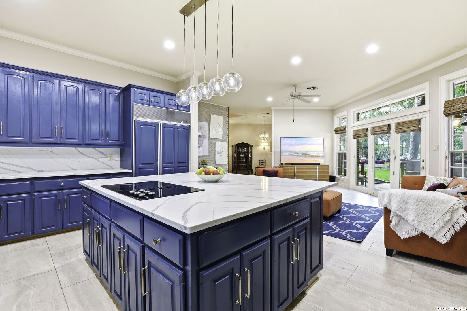 21759 Forest Waters Circle Garden Ridge, TX 78266 - Photo 12 of 30 a kitchen that has a sink a stove and a table in it