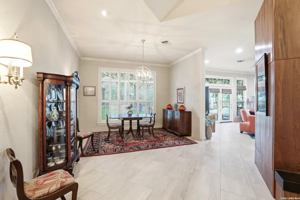 a view of a dining room with furniture window and outside view