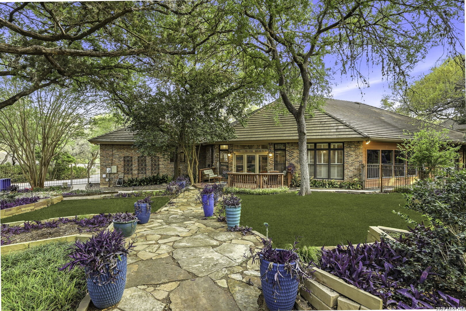21759 Forest Waters Circle Garden Ridge, TX 78266 - Photo 21 of 30 a front view of a house with garden