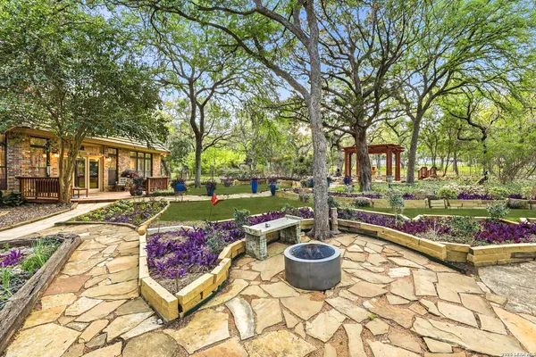 a view of a patio with swimming pool