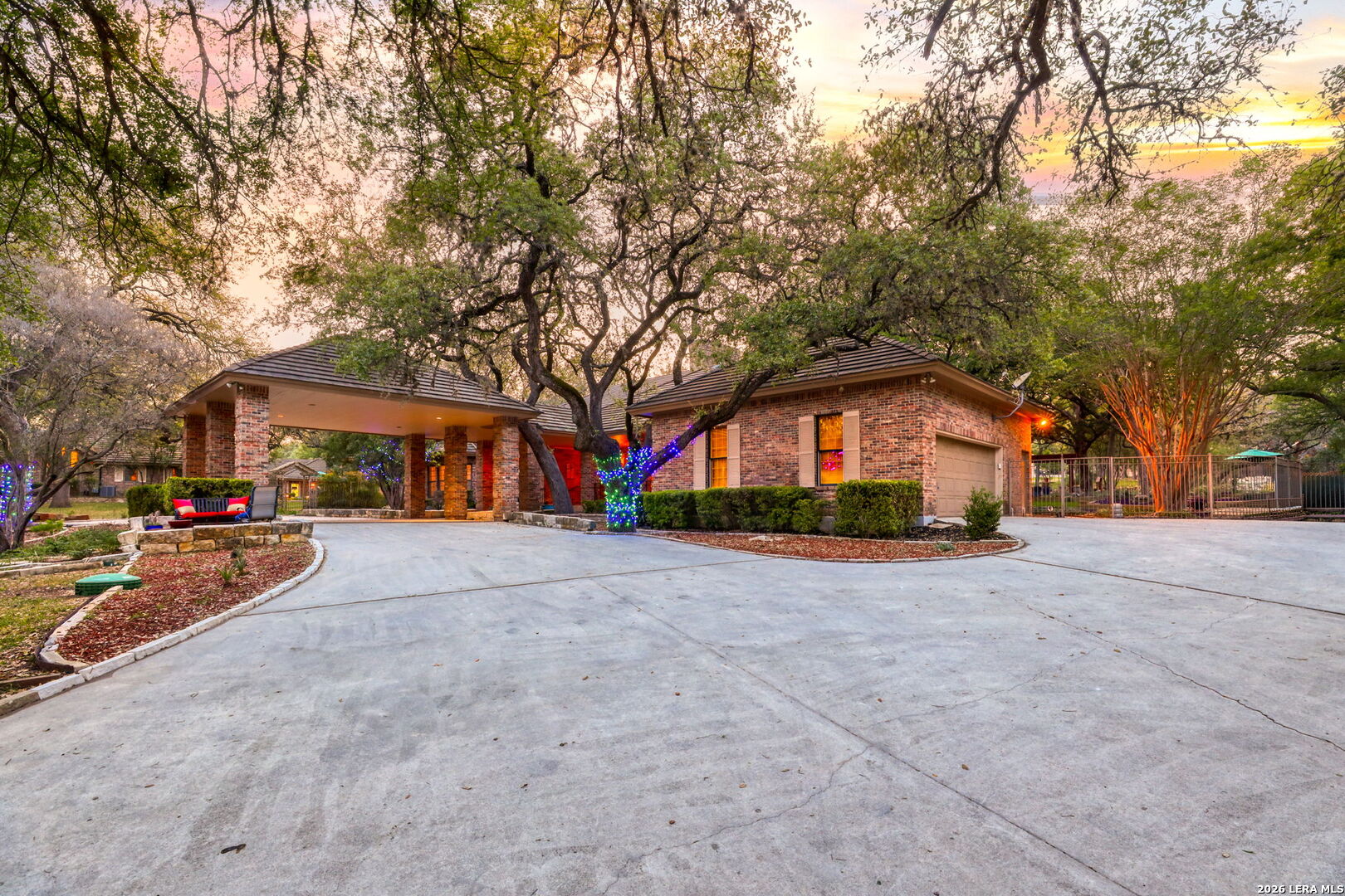 21759 Forest Waters Circle Garden Ridge, TX 78266 - Photo 23 of 30 a front view of a house with a yard and garage