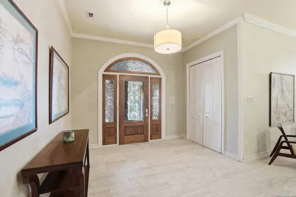 a view of a livingroom with furniture window and wooden floor