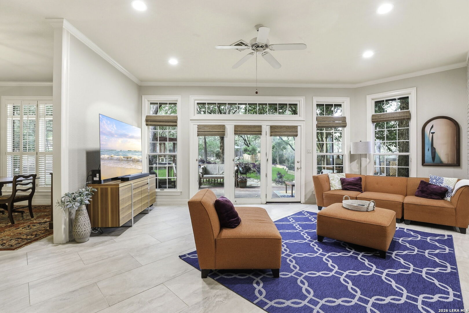 21759 Forest Waters Circle Garden Ridge, TX 78266 - Photo 9 of 30 a living room with furniture and large windows