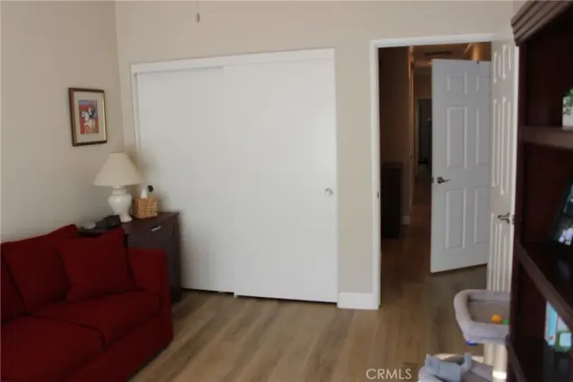 a living room with furniture and a gate