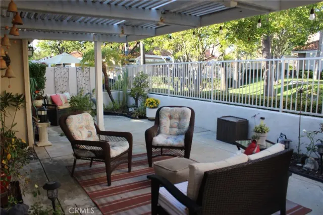 a view of a chairs and tables in patio