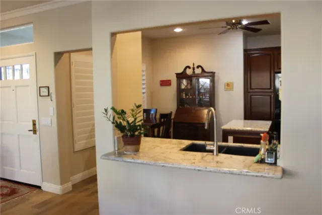 a view of a living room and dining room