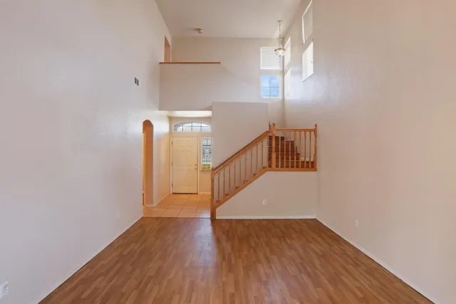 a view of entryway with wooden floor