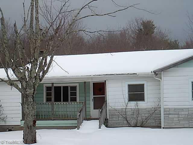 1063 Roe Hunt Road Laurel Springs, NC 28644 - Photo 2 of 4 Exterior Front.