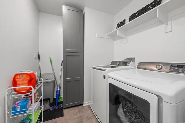 a utility room with dryer and washer