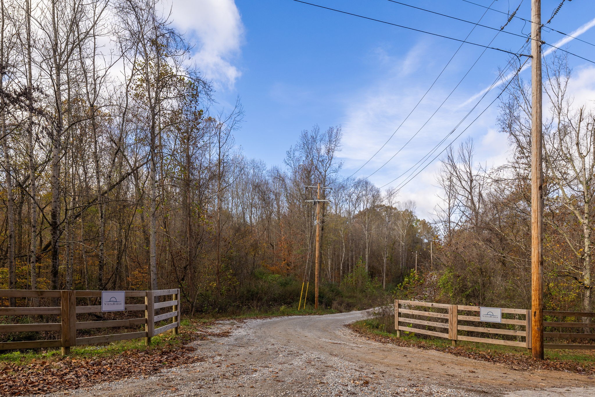 0 Lake Ridge Drive Stewart, TN 37175 - Photo 19 of 43 a view of backyard with wooden fence and trees