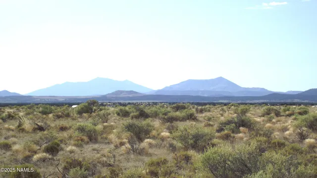 a view of an outdoor space and mountain view